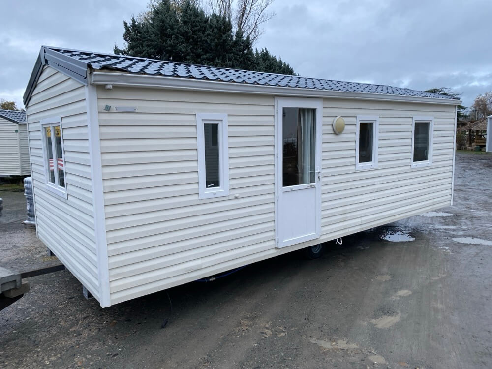 mobil home d'occasion isolé 4 saison double vitrage renfocé deux chambre salon centrale